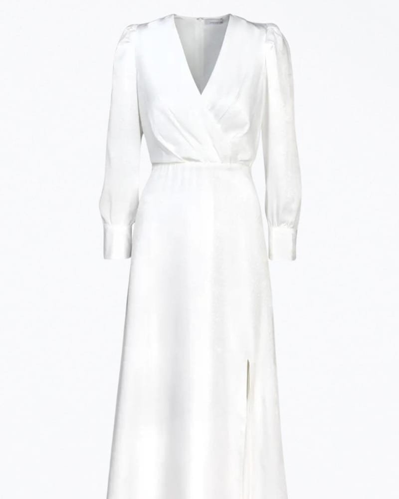 Front of a model wearing a size XL Brandy Wrap-Effect Sateen Maxi Dress in White in White by Adelyn Rae. | dia_product_style_image_id:344726